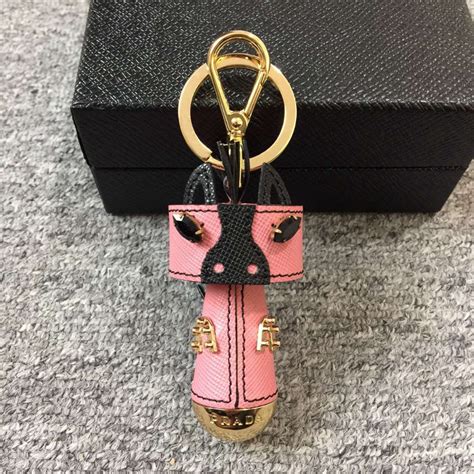 attach prada key chain to bag|how to place keychains on a bag.